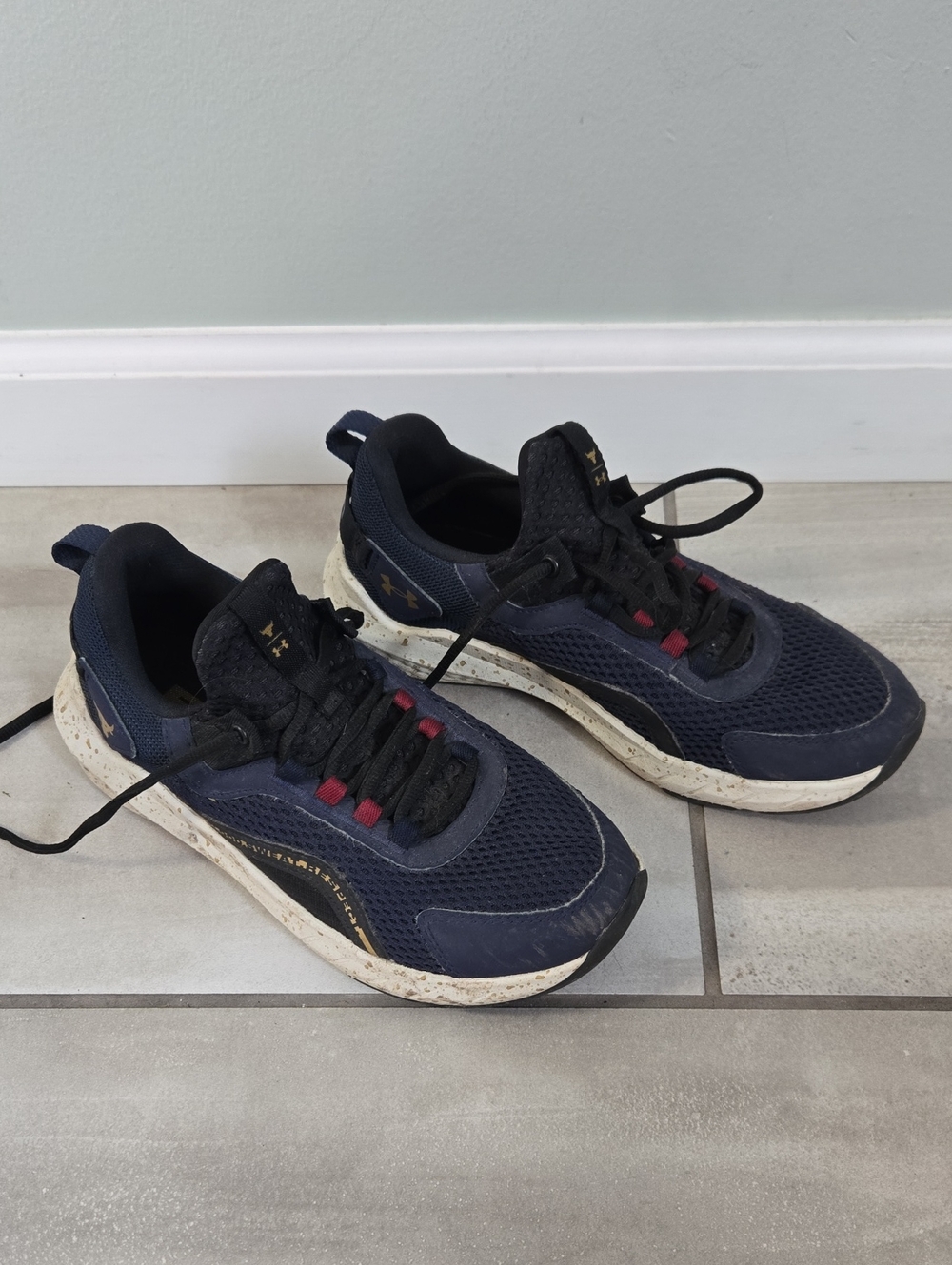 Under Armour Navy and Black Kids Athletic Sneakers with Red Accents